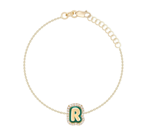 This is an image of our enamel letter bracelet with cz stones in green R on a white backgroundn