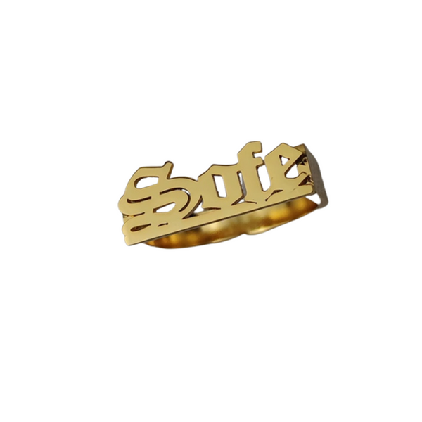 This is an image of our gold nameplate necklace on a white background that reads SOFE