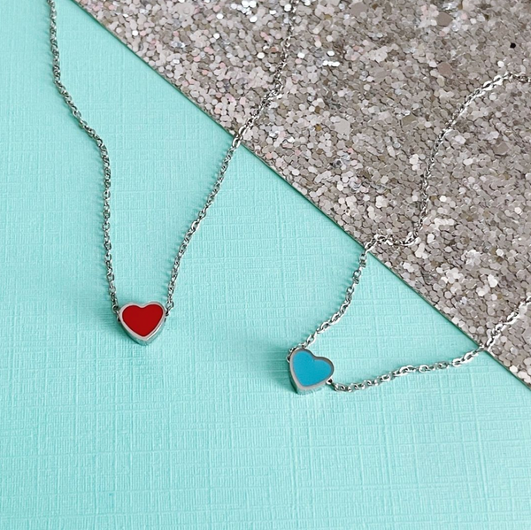 red and blue sliding heart necklace
