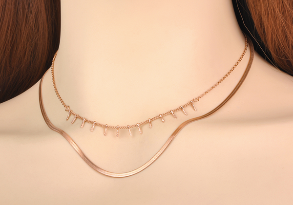 This is an image of our rose gold perfect layers double necklace on a model.